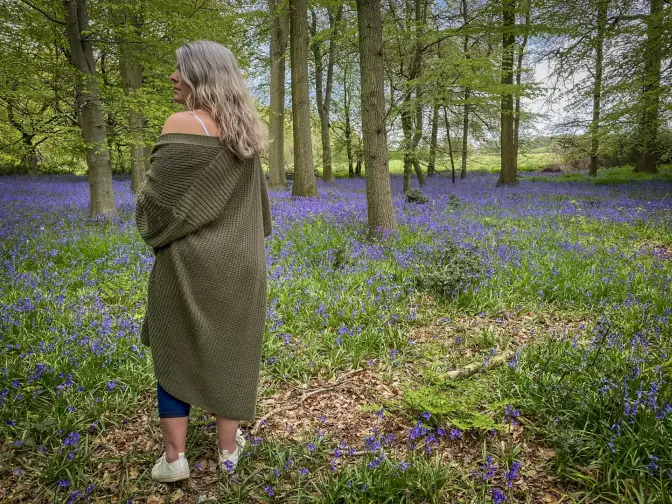 From Seeker to Reiki Master: Uncovering My Story in Maidenhead. Reiki Master walking through bluebell woods